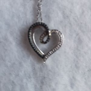 Sterling silver open heart necklace w black diamonds.
